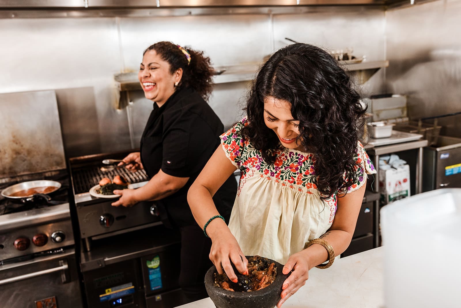 Reyna Maldonado and her mom Ofelia Barajas, co-owners of La Guerrera’s Kitchen, are amongst the 100 small diverse businesses in Oakland that received a $10,000 grant from the Comcast RISE Investment Fund. (Photo by: Carolyn Fong, courtesy of La Guerrera’s Kitchen.)