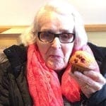 Frances Robinson eating a muffin