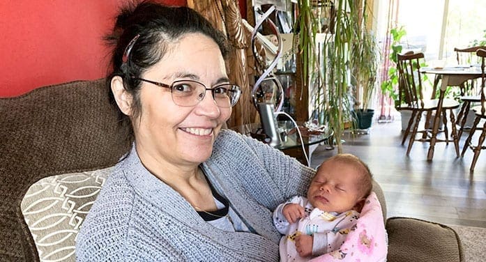 Nina-Greene-with-her-baby-grandchild-697 • Troy Media Nina Greene with her baby grandchild