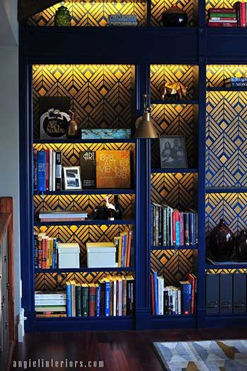 A cobalt blue and gold library bookcase with Deco Diamonds, Angiel Interiors, via Pinterest