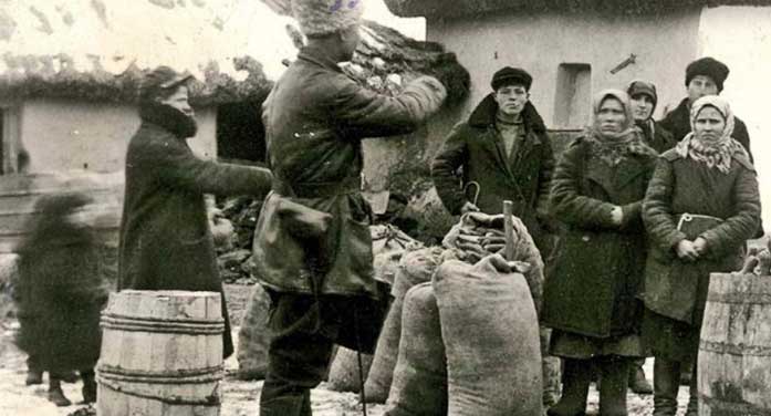 Soldiers-confiscate-grain-from-peasants-in-Novokrasne-Ukraine-697 • Troy Media soldiers Novokrasne Ukraine peasants Holodomor history Soviet famine-genocide