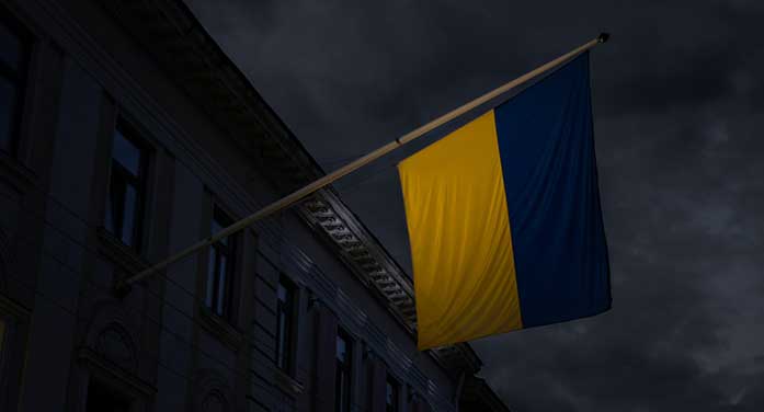 Ukraine Ukrainian flag storm clouds shadow