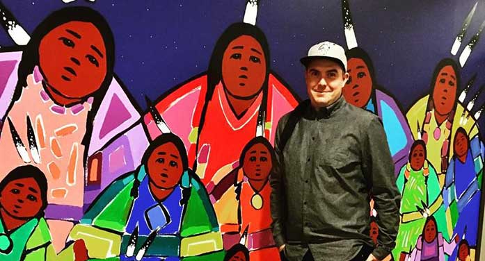 Deneh'Cho-Thompson-in-front-ot-indifenous-mural-697 • Troy Media Deneh'Cho Thompson artist theatre indigenous