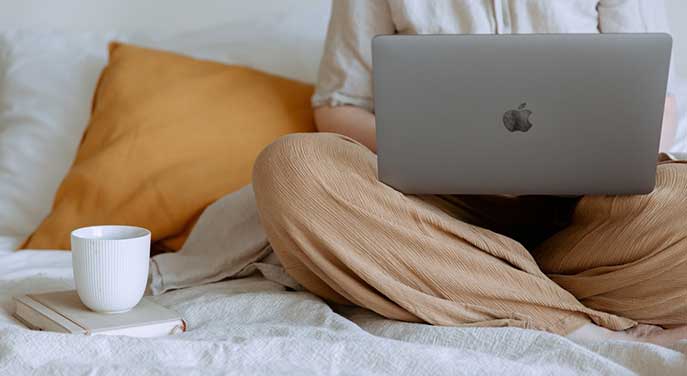 Coffee-cup-working-on-laptop