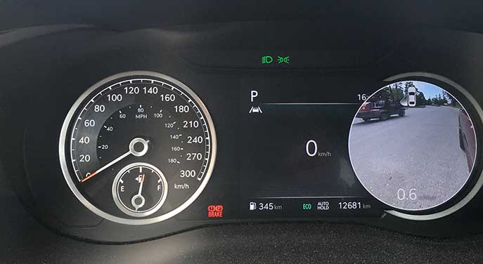 The Blind-Spot View Monitor shows a rearward view on the instrument cluster when turning
