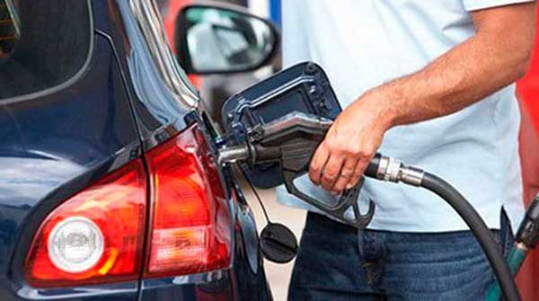 Carbon tax a crushing load at the fuel pump