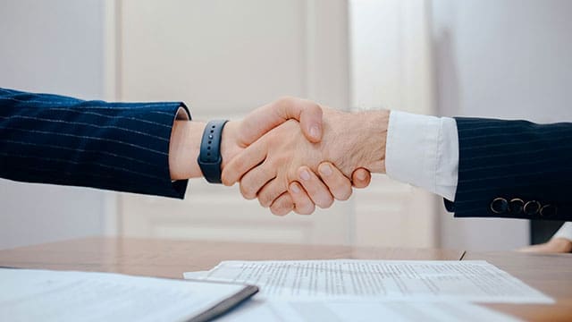 Career-business-negotiation-handshake • Troy Media job rejection job search stratefied job search