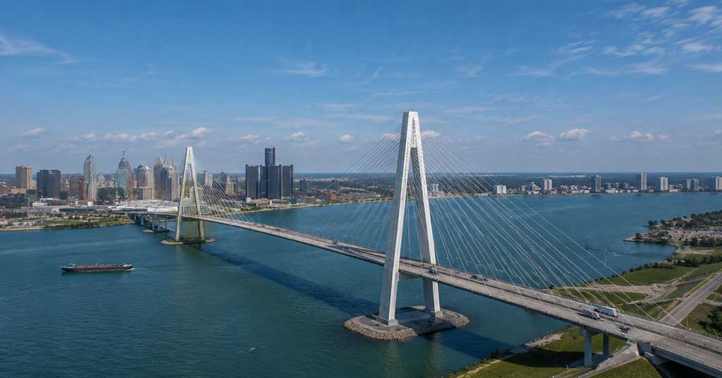 The Gordie Howe bridge project, vital for Canada and United States trade, faces delays that threaten the economic stability of this critical trade corridor